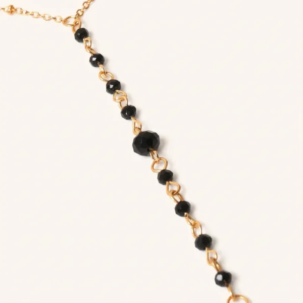 Delikatny body chain z wiszącą linią koralików
