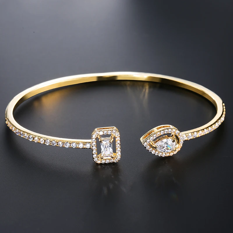 Bransoleta open cuff z asymetrycznymi kamieniami