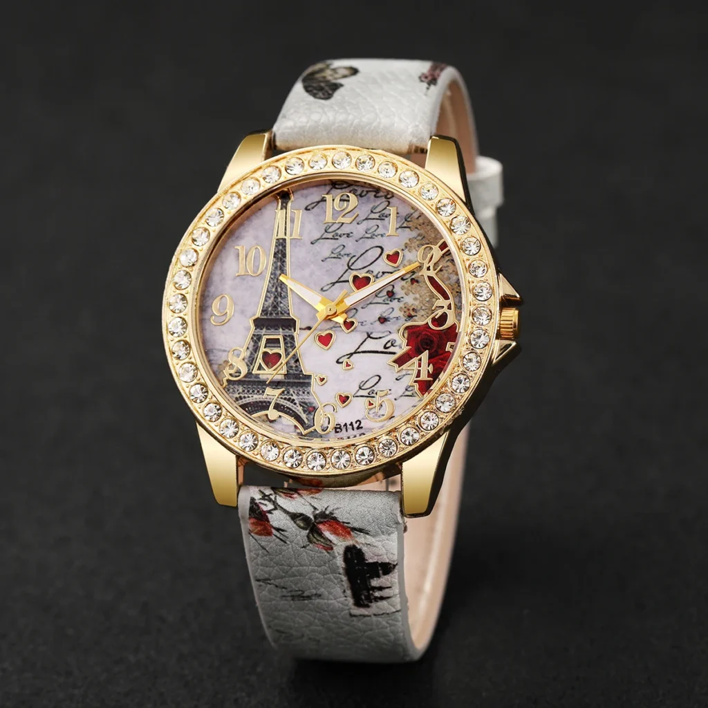 Damski zegarek z motywem wieży Eiffla i kryształową lunetą